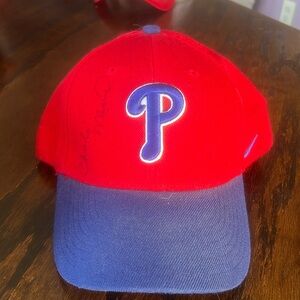 Philadelphia Phillies hats signed by Charlie Manuel
